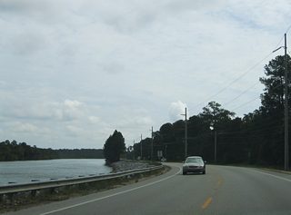 SR 180 (Canal Drive) straddles the Intracoastal Waterway eastward from Gulf Shores into Orange Beach.