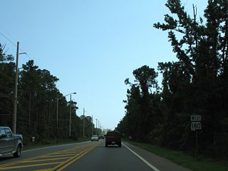 Continuing south on E 2nd Street and SR 180 between E 20th and 16th Avenues.
