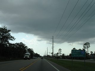 Guide signs direct motorists to the Foley Beach Express along SR 161 north from SR 182 west onto SR 180 to the Intracoastal Waterway toll bridge. The Baldwin Beach Express provides a direct route from the Foley Beach Express to Interstate 10.