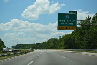 Opened in 1990, the Mooresville bypass opened leads Interstate 565 directly to the exchange with I-65 at Exit 1. Exit 1 departs west beyond Piney Creek.
