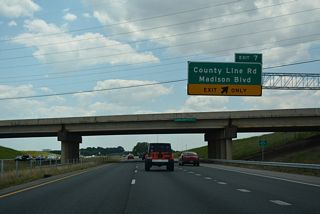 Madison Boulevard ties into County Line Road at the westbound ramps with I-565. County Line Road north serves a number of subdivisions from Interstate 565 to U.S. 72 through the city of Madison. Exit 7 opened to traffic on the morning of April 10 (WAAY, 2015).