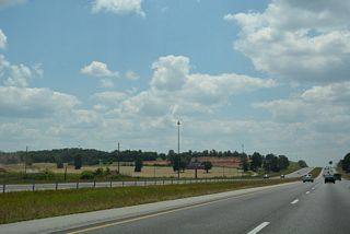 The site where Town Madison was developed west of Zierdt Road and south of I-565. A directional T interchange (Exit 10) with Town Madison Boulevard was constructed on here as well.