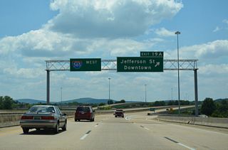 The single point urban interchange (SPUI) at Exit 19 A joins Interstate 565 with Jefferson Street south along the couplet with Washington Street north. Jefferson Street leads into Downtown and serves interests to the Von Braun Center via Monroe Street.
