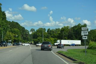 George Wallace Drive continues south from SR 291/759 to Padenreich Avenue and a grid of residential streets. SR 759 arcs southwest across the Coosa River to become Interstate 759 at U.S. 411.