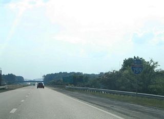 Removed after 2008, the first westbound reassurance shield for Interstate 759 previously appeared along the causeway across Black Creek Lake.
