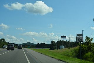 SR 759 stems west from SR 291 (George Wallace Drive) along a four lane expressway to Interstate 759 at U.S. 411 (Rainbow Drive). SR 759 arcs southwest by a retail plaza and an arm of H. Neely Henry Lake on this stretch.