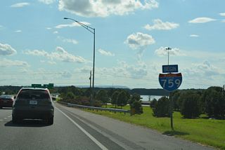 A begin shield for Interstate 759 stands within the exchange at U.S. 411.