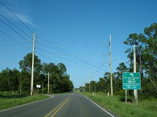 Cotton Creek Drive carries CR 4 east from SR 59 (Gulf Shores Parkway) at 36th Avenue to the Foley Beach Express. Connections to the toll bridge south into Orange Beach are provided by Roscoe Road north to Bradford Road east.