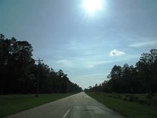 Heading west along Waterway W Boulevard through an area that was originally slated for the massive Bon Secour Village development. Only a handful of streets were built in 2006, and much of the area remained undeveloped due to financial woes of the developing company and the real estate collapse of the late 2000s. However, developed ensued in earnest by the late 2010s.