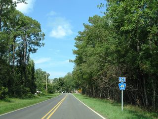 CR 49 South crosses paths with Bon Secour Highway 1.25 miles north of River Road at Bon Secour.