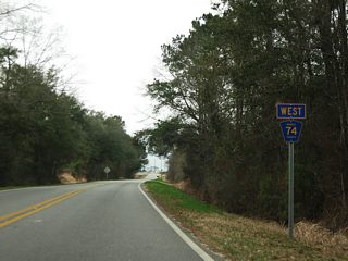 CR 74 begins and heads west from CR 5 (Wilmer Road) along Howells Ferry Road.