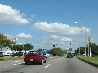 Busy with commuter and local traffic throughout the day, Dauphin Street east intersects Midtown Park East.