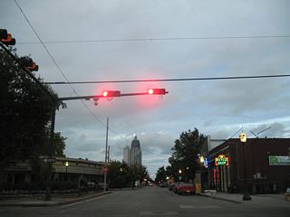 Spring Hill Avenue merges with Dauphin Street after their respective intersections with Washington Avenue at the beginning of the Lower Dauphin Entertainment District (LoDa).