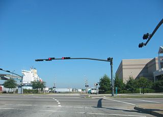 Dauphin Street ties into Water Street across from the Arthur R. Outlaw Mobile Convention Center, a CSX Railroad spur and the Mobile River.