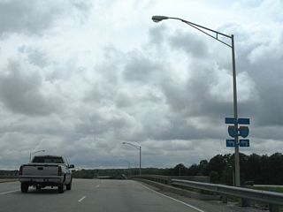 A diamond interchange joins Interstate 65 with Dauphin Street at Exit 4.