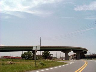 Delchamps Drive north at Beauregard Street west and Robert M. Hope Overpass. Dekle Drive extends north through the Alabama State Docks area to Telegraph Road (old U.S. 43).