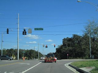 Grelot Road extends a quarter mile east from a five-way roundabout with Dawes Road and Air Terminal Drive to Leroy Stevens Road. Serving commuter traffic, Leroy Stevens Road converges with Dawes Road to the north and separates with Jeff Hamilton Road just to the south.