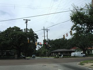 Houston Street north at U.S. 90 (Government Boulevard) and Old Government Street west. Old Government Street separates with the westbound beginning of Airport Boulevard in one block.