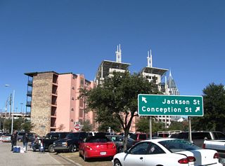 Conception Street branches away from Jackson Street and shifts two blocks eastward into Downtown. Joachim Street southbound enters opposite Conception to merge with Claiborne Street.