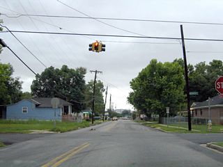 Kennedy Street is a local through street north from Spring Hill Avenue to Martin Luther King, Jr. Avenue. This double flasher on Kennedy Street south at Congress Street replaced a one-piece, four way traffic light in the Fall 2002.