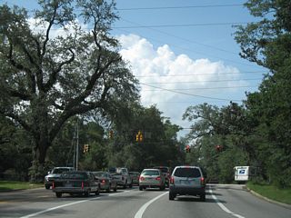Knollwood Drive north at Cottage Hill Road. Knollwood Drive runs north from U.S. 90 (Government Boulevard) and across Halls Mill Creek to Grelot Road in Mobile.