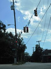 A mixture of 30" Crouse Hinds and Traffic Signal Corporation signals at the intersection of Mobile Infirmary Boulevard south, Kenneth Street north and Old Shell Road.