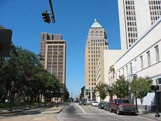 Saint Joseph Street south at Dauphin Street. The former bus lane adjacent to Bienville Square was replaced with additional on-street parking by 2022. The city of Mobile considered converting St. Louis Street into a two-way street in 2003.