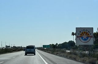 Interstate 8 enters the Yuma city limits west at 10th Avenue E. 10th Avenue is ten miles from the city center.