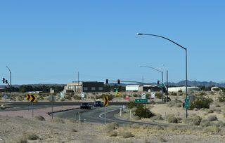 Business Loop I-8 follows the frontage road southwest onto 8th Avenue E at 32nd Street.