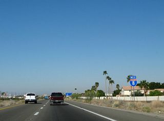 Interstate 8 advances 1.75 miles west from Foothills Boulevard to a diamond interchange (Exit 12) with Fortuna Road.