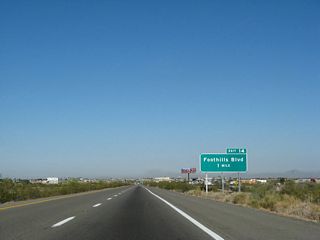Interstate 8 flattens out beyond the Gila Mountains, lowering from near 700 feet in elevation to 334 feet at the diamond interchange (Exit 14) with Foothills Boulevard.