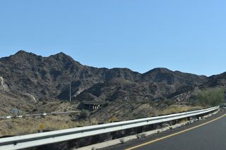 Entering Telegraph Pass, the westbound roadway shifts south across the eastbound roadway due to grade differences.