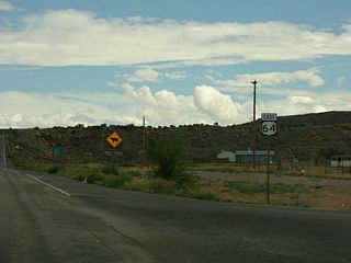 U.S. Highway 64 begins at U.S. Highway 160 in Teec Nos Pos. This is the first eastbound shield.