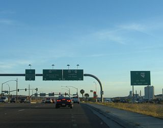 Following the extensive downhill grade west in Bullhead City, SR 68 ends at SR 95 just east of the Colorado River bridge connecting to Nevada State Route 163 and Laughlin. SR 95 travels south from the state line into Downtown Bullhead City.