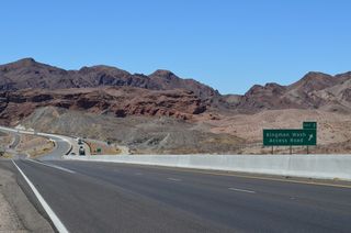 U.S. 93 upgrades to a freeway along the Hoover Dam Bypass at the diamond interchange (Exit 2) with Kingman Wash Access Road.