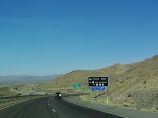 Prior to October 2010, commercial traffic was directed onto SR 68 west at Exit 67 due to the truck restriction on U.S. 93 at Hoover Dam. The detour followed SR 68 into Bullhead City, westbound SR 163 past Laughlin, Nevada and northbound U.S. 95 through Searchlight to U.S. 93 near Boulder City.