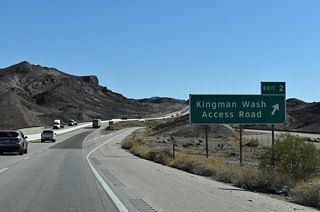 Kingman Wash Access Road spurs northeast from Exit 2 toward Fortification Hill in the Black Mountains.