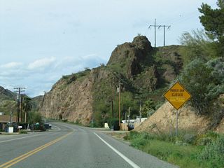SR 95 Spur (Parker Dam Road) extends north from SR 95 beside RV Resorts and residences along the adjacent Colorado River.