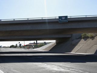 Interstate 40 curves southeast along the Colorado River from Needles into Arizona at Topock. Arizona State Route 95 resumes south from I-40 at Exit 9.