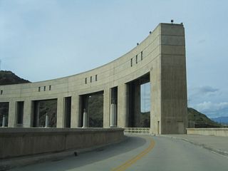 Entering the Golden State midway across the Colorado River, Parker Dam Road arcs west across the top of Parker Dam.