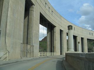 Art deco columns stand along the roadway across Parker Dam.