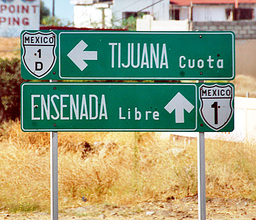 Mexico federal highways 1 and 1D on green signs in Rosarito
