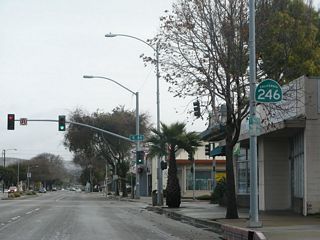 SR 1 is omitted from reassurance markers posted along the overlap with SR 246 on Ocean Avenue. This assembly appears after the two routes combine at H Street.