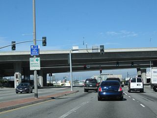 Ramps connecting to Interstate 105 (Glenn Anderson [Century] Freeway) pass over California 1, with access to the freeway afforded via Imperial Highway. The west end of I-105 joins Imperial Highway ahead of California Street.