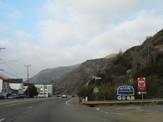 Removed by 2011, a California 1 reassurance shield was previously posted at Tuna Canyon Road, adjacent to the "Malibu: 27 Miles of Scenic Beauty" sign. While the city of Malibu extends for 21 miles, the entire length of coast known as "Malibu" extends for 27 miles.
