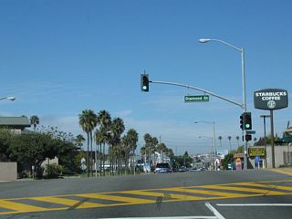 Northbound California 1 (Pacific Coast Highway) meets Diamond Street at this traffic signal.