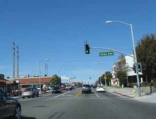 After passing by Carnelian Street, Beryl Street, and Agate Street, California 1 intersects with Irena Avenue here. Irena Avenue travels southeast toward Redondo Union High School.