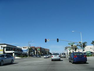Northbound California 1 (Pacific Coast Highway) at Herondo Street west and Anita Street / 190th Street east. At this intersection, California 1 leaves Redondo Beach and enters the city of Hermosa Beach (population was 18,566 as the 2000 Census and incorporated on January 14, 1907).