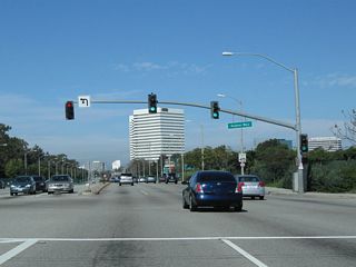 Northbound California 1 (Sepulveda Boulevard) meets Hughes Way. Several defense contractors are also located in El Segundo, making for a diverse economy.