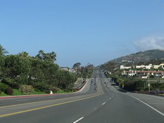Progressing northwest through Monarch Beach, the PCH crosses Monarch Beach Golf Links rises along side Monarch Bay Plaza.
